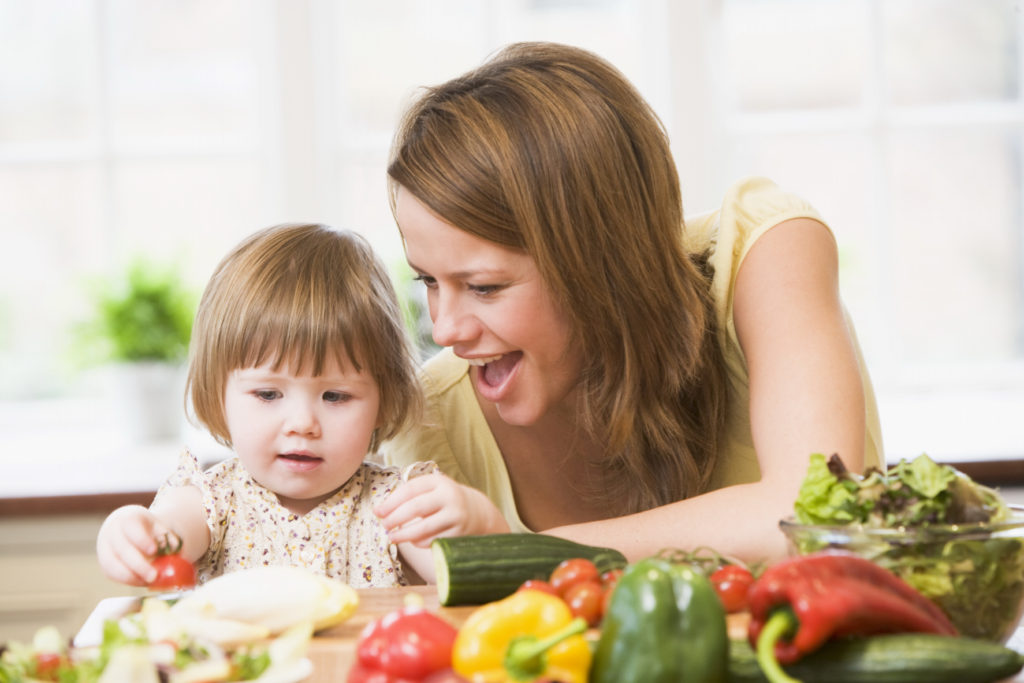 mom and a kid eating in a kitchen 1024x683 - Tips for Being a Great Parent
